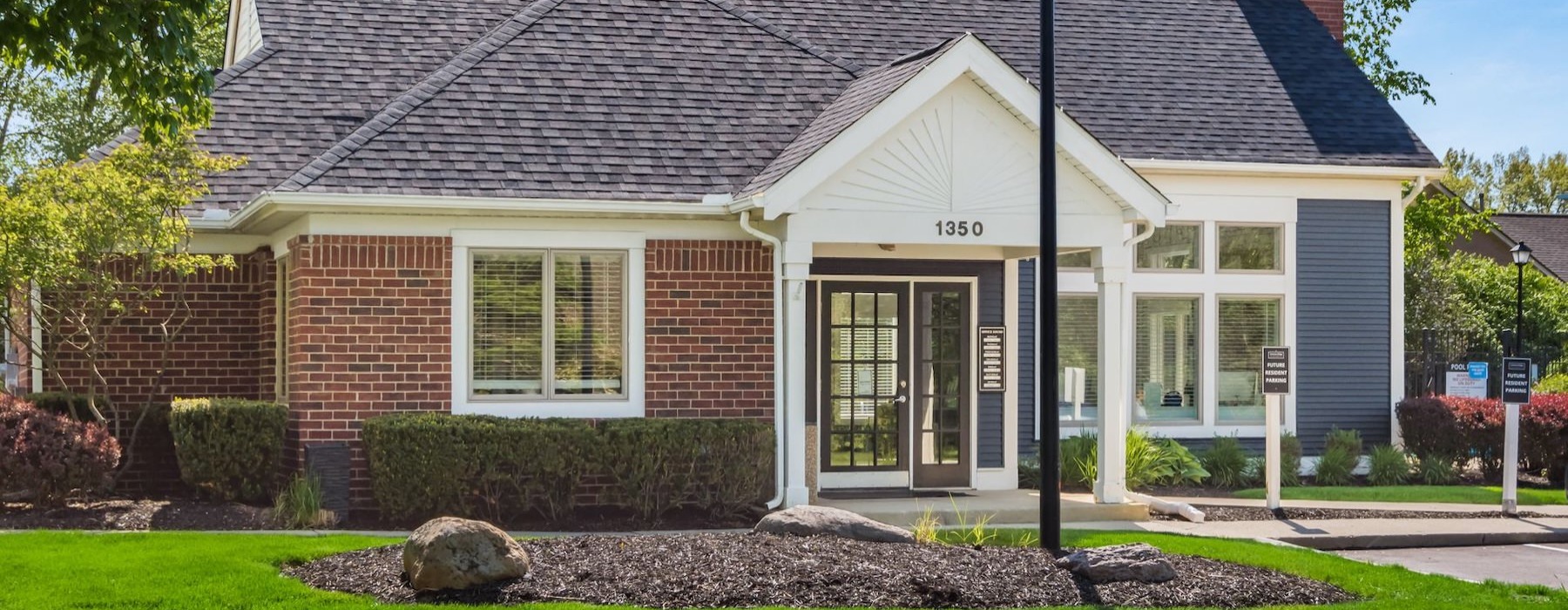 a house with a light post in front of it
